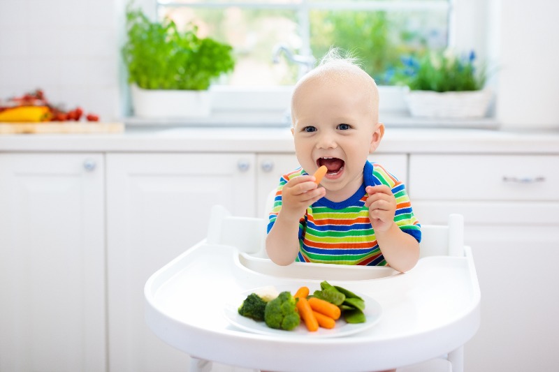 Child eating veggies