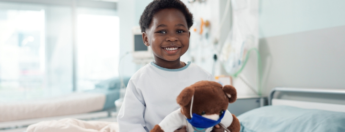 A child in hospital with a teddy