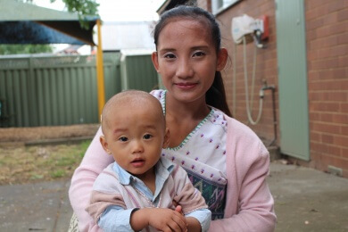 Young Karen refugee with child
